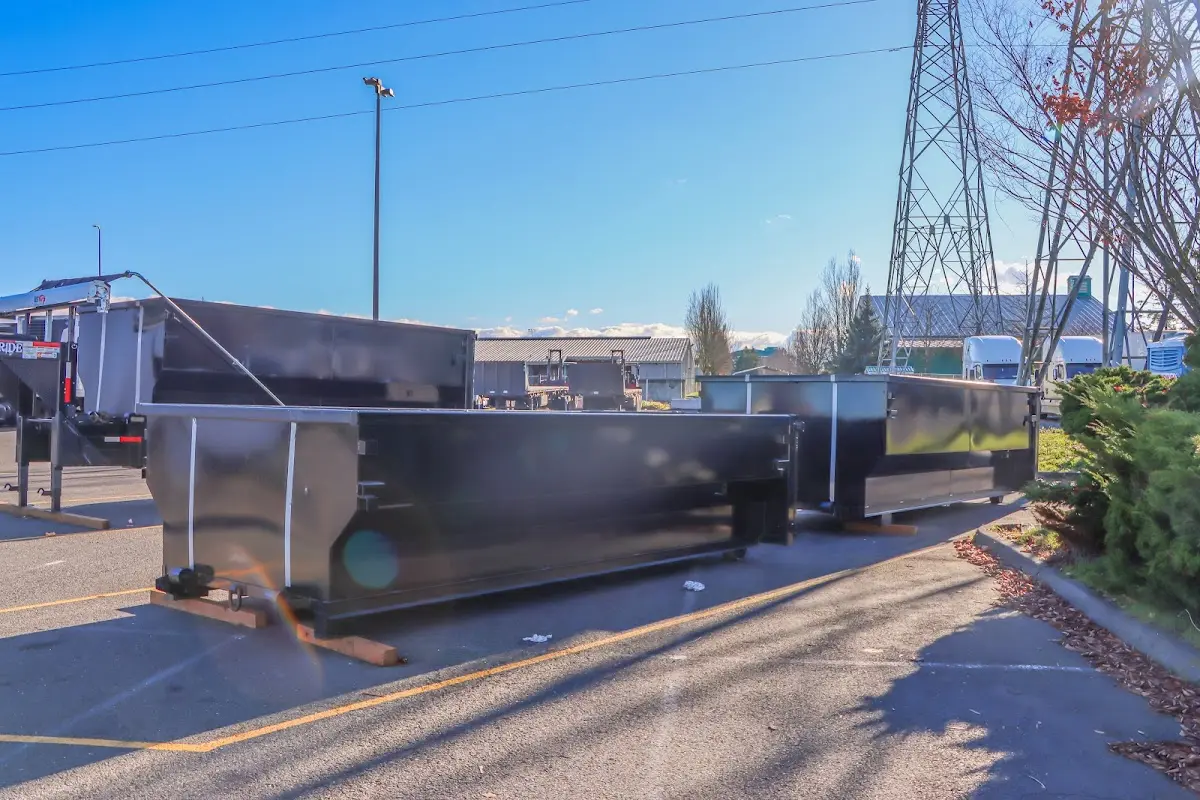 Roll-off dumpster ready for waste disposal at job site for Commercial Dumpster Rental in Novi